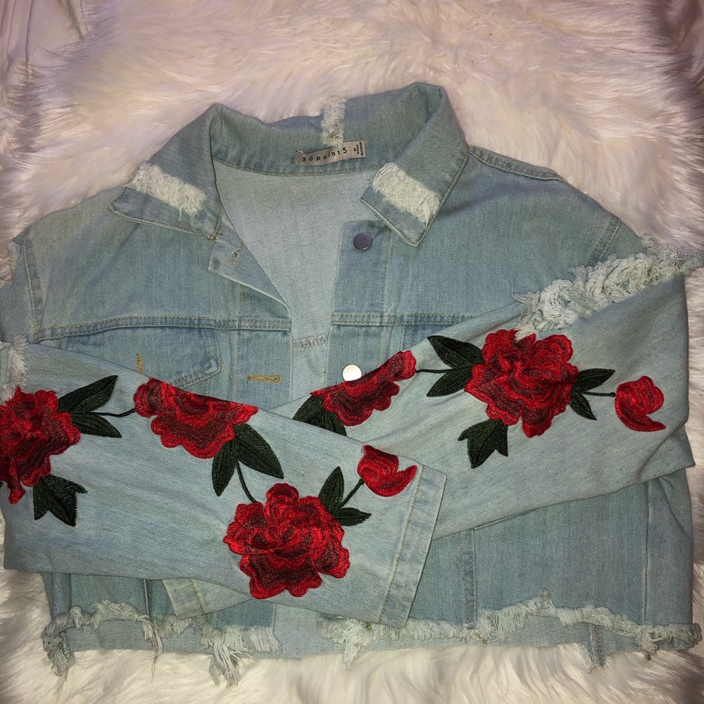 Distressed crop denim roses jacket.